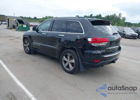 2014 Jeep Grand Cherokee Overland из США, поврежденный, VIN 1C4RJFCMXEC386678